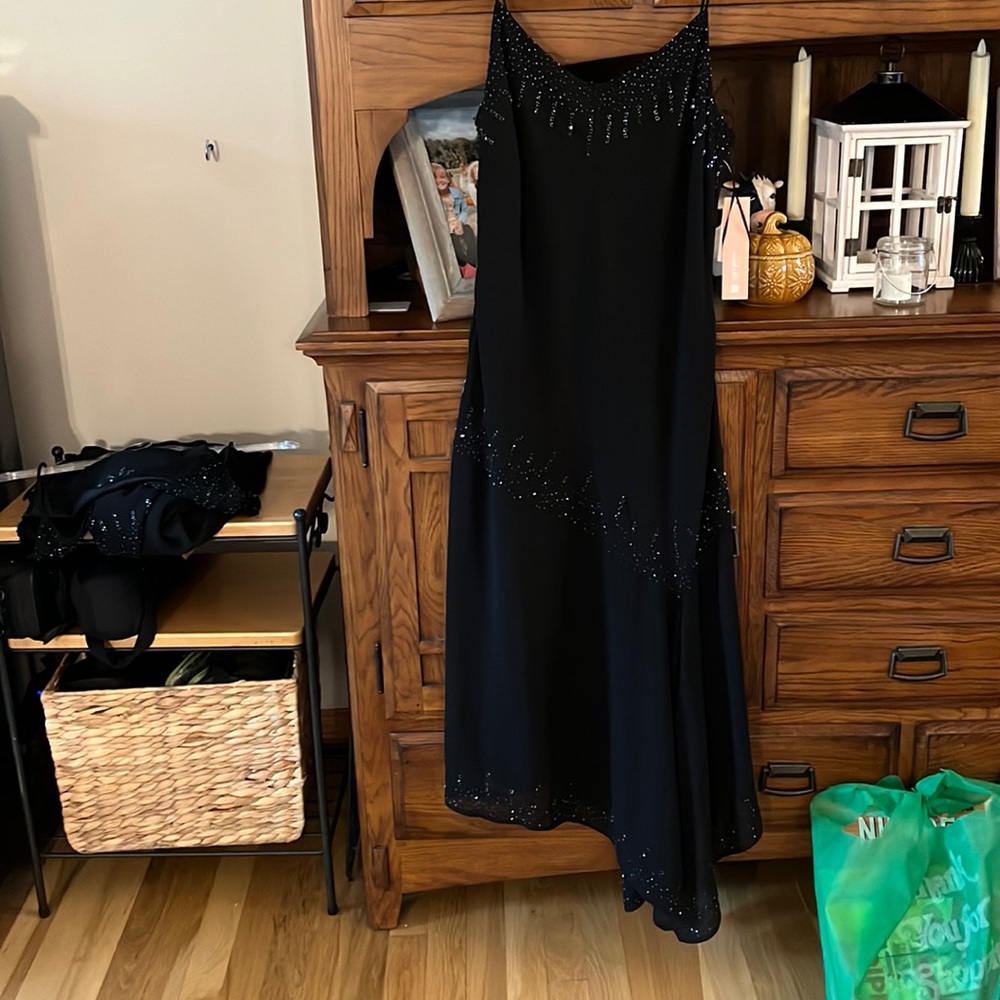 Long black sequined gown. NWT size 10